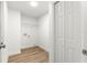 Walk-in closet with wood laminate floors and shelving at 14876 Se 34Th Ter, Summerfield, FL 34491