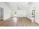 Spacious living room area with contemporary flooring and neutral color scheme at 14876 Se 34Th Ter, Summerfield, FL 34491
