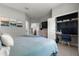 Bright bedroom with an office nook, neutral walls, carpet, and natural light at 155 Marion Oaks Pass, Ocala, FL 34473