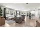 Bright and airy living room featuring hardwood floors and an open layout at 155 Marion Oaks Pass, Ocala, FL 34473