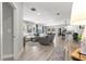 Bright open-concept living space features the kitchen and dining area, with lots of natural light at 155 Marion Oaks Pass, Ocala, FL 34473