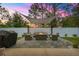 Outdoor entertaining area with comfortable seating, a barbecue grill, and a fire pit at 155 Marion Oaks Pass, Ocala, FL 34473