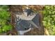 Birds eye view of a gray roof against a woodsy setting at 158 Guava Pass, Ocklawaha, FL 32179