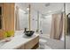 Bathroom featuring granite counters, modern fixtures, and tiled shower with tub at 158 Guava Pass, Ocklawaha, FL 32179