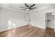 Spacious bedroom with hardwood floors and walk-in closet at 158 Guava Pass, Ocklawaha, FL 32179