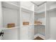 Well-organized walk-in closet with shelving and storage at 158 Guava Pass, Ocklawaha, FL 32179