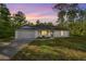 Charming single-story home with a well-manicured lawn, neutral paint, and inviting curb appeal at 158 Guava Pass, Ocklawaha, FL 32179