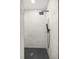 Walk-in shower featuring sleek black fixtures and modern tiling at 158 Guava Pass, Ocklawaha, FL 32179