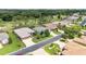 Beautiful homes in a quiet neighborhood, surrounded by lush greenery and landscaping, near a golf course at 16023 Sw 14Th Avenue Rd, Ocala, FL 34473