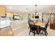 Charming dining area adjacent to the kitchen with seating for four and open to other living spaces at 16023 Sw 14Th Avenue Rd, Ocala, FL 34473