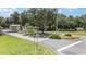Community entrance with manicured landscaping and decorative signage welcomes residents at 16023 Sw 14Th Avenue Rd, Ocala, FL 34473