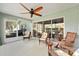Spacious screened lanai with multiple seating areas, perfect for enjoying the outdoors at 16023 Sw 14Th Avenue Rd, Ocala, FL 34473