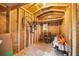 Shed interior featuring wood studs and rafters, window and storage for tools and gear at 19620 Fox Trl, Dunnellon, FL 34432