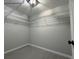 Walk-in closet featuring custom shelving for optimal storage at 19990 Sw 75Th St, Dunnellon, FL 34431
