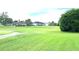 Beautiful view of the community's well-maintained green spaces, creating a peaceful and inviting atmosphere at 2100 Nw 50Th Cir, Ocala, FL 34482