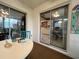 Bright Florida room providing views into the home's kitchen and dining areas at 2100 Nw 50Th Cir, Ocala, FL 34482