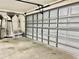 View of a garage with an open door, providing a clear visual of the available space at 2100 Nw 50Th Cir, Ocala, FL 34482