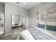 Bedroom featuring mirrored closet doors, artwork, and lots of natural light at 2418 Se 22Nd Pl, Ocala, FL 34471