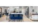 Eat-in kitchen with sleek countertops, an island with seating, and stainless steel appliances at 2418 Se 22Nd Pl, Ocala, FL 34471