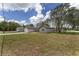 Charming one-story home featuring a well-kept lawn and an attached garage at 26 Water Track Dr, Ocala, FL 34472