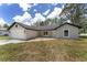 Beautiful single-story home with a fresh exterior, and landscaped front yard at 26 Water Track Dr, Ocala, FL 34472