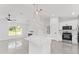 Open concept kitchen with a center island, stainless steel appliances, and pendant lighting at 26 Water Track Dr, Ocala, FL 34472
