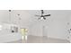 Open living space features recessed lighting, a ceiling fan, and sliding glass doors to the yard at 26 Water Track Dr, Ocala, FL 34472