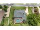 Aerial view of home featuring a large lot, well-manicured lawn and screened pool at 2908 Se 22Nd Ave, Ocala, FL 34471
