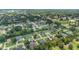 Aerial view of a beautiful neighborhood showcasing lush landscaping and mature trees at 2908 Se 22Nd Ave, Ocala, FL 34471