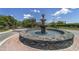 A three-tiered stone fountain welcomes you to the community at 2908 Se 22Nd Ave, Ocala, FL 34471