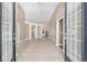 Open foyer with tile flooring, soaring ceilings, and views of the living spaces at 2908 Se 22Nd Ave, Ocala, FL 34471