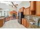 Bright kitchen featuring granite countertops, stainless steel appliances, and custom cabinets at 2908 Se 22Nd Ave, Ocala, FL 34471