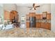 Modern kitchen with stainless steel appliances, granite countertops, and plenty of storage space at 2908 Se 22Nd Ave, Ocala, FL 34471