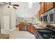 Kitchen featuring granite countertops, stainless appliances, and modern lighting at 2908 Se 22Nd Ave, Ocala, FL 34471