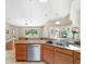 Kitchen area with granite countertops, stainless appliances, and breakfast bar at 2908 Se 22Nd Ave, Ocala, FL 34471