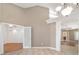 Bright living space featuring tile flooring, vaulted ceilings, and an open doorway at 2908 Se 22Nd Ave, Ocala, FL 34471
