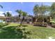 Lovely pool area, showcasing the screened-in enclosure, manicured landscaping, and serene backyard at 2908 Se 22Nd Ave, Ocala, FL 34471
