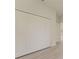 Large closet with bi-fold doors offers ample storage space, set against neutral walls and light flooring at 3325 Sw 165Th Loop, Ocala, FL 34473