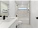 Clean bathroom with a single vanity, tub, shower, and black hardware at 36 Pine Radl, Ocala, FL 34472