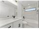 Modern bathroom featuring a tub, shower with sleek black hardware, and a marble countertop at 36 Pine Radl, Ocala, FL 34472