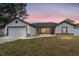 Charming single-story home with garage and neutral exterior at 36 Pine Radl, Ocala, FL 34472