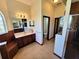 Bright bathroom featuring a vanity with marble countertops, a walk-in shower, and tile flooring at 3803 Se 6Th Ave, Ocala, FL 34480