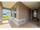 Inviting front porch with stone accents, offering a welcoming entrance to the home at 4474 Nw 53Rd Ave Rd, Ocala, FL 34480