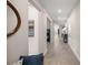 Bright and airy hallway with wood-look floors and stylish decor at 4474 Nw 53Rd Ave Rd, Ocala, FL 34480