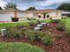 Inviting single-Gathering home with well-maintained garden, charming water feature and lush green lawn at 6172 Sw 101St Pl, Ocala, FL 34476