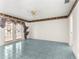 Living room featuring French doors, tiled floor, and ceiling fan at 6172 Sw 101St Pl, Ocala, FL 34476