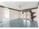 Living room featuring ceiling fan, French doors, and tiled floor at 6172 Sw 101St Pl, Ocala, FL 34476