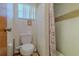 A bathroom featuring a toilet, bidet, and shower with tile surround at 6773 Se 87Th St, Ocala, FL 34472