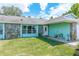 Close up of a single story home with a well-maintained front yard at 6773 Se 87Th St, Ocala, FL 34472