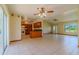Open kitchen and dining area with dark countertops and views to the living area at 6773 Se 87Th St, Ocala, FL 34472